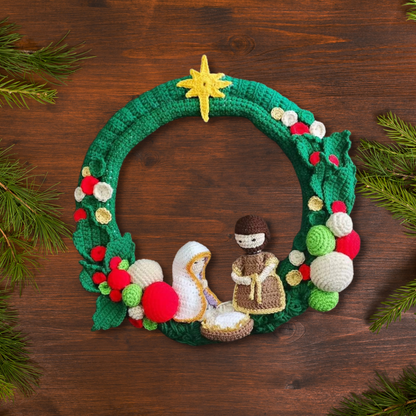 Crochet Christmas wreath with birth of Jesus.